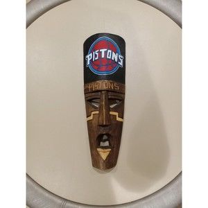 Hand carved Africa pistons art